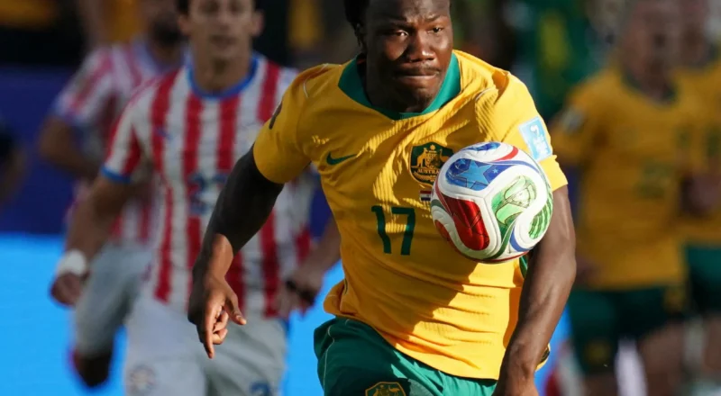 Socceroos secure place in World Cup last 32 after nerve-shredding draw with Paraguay