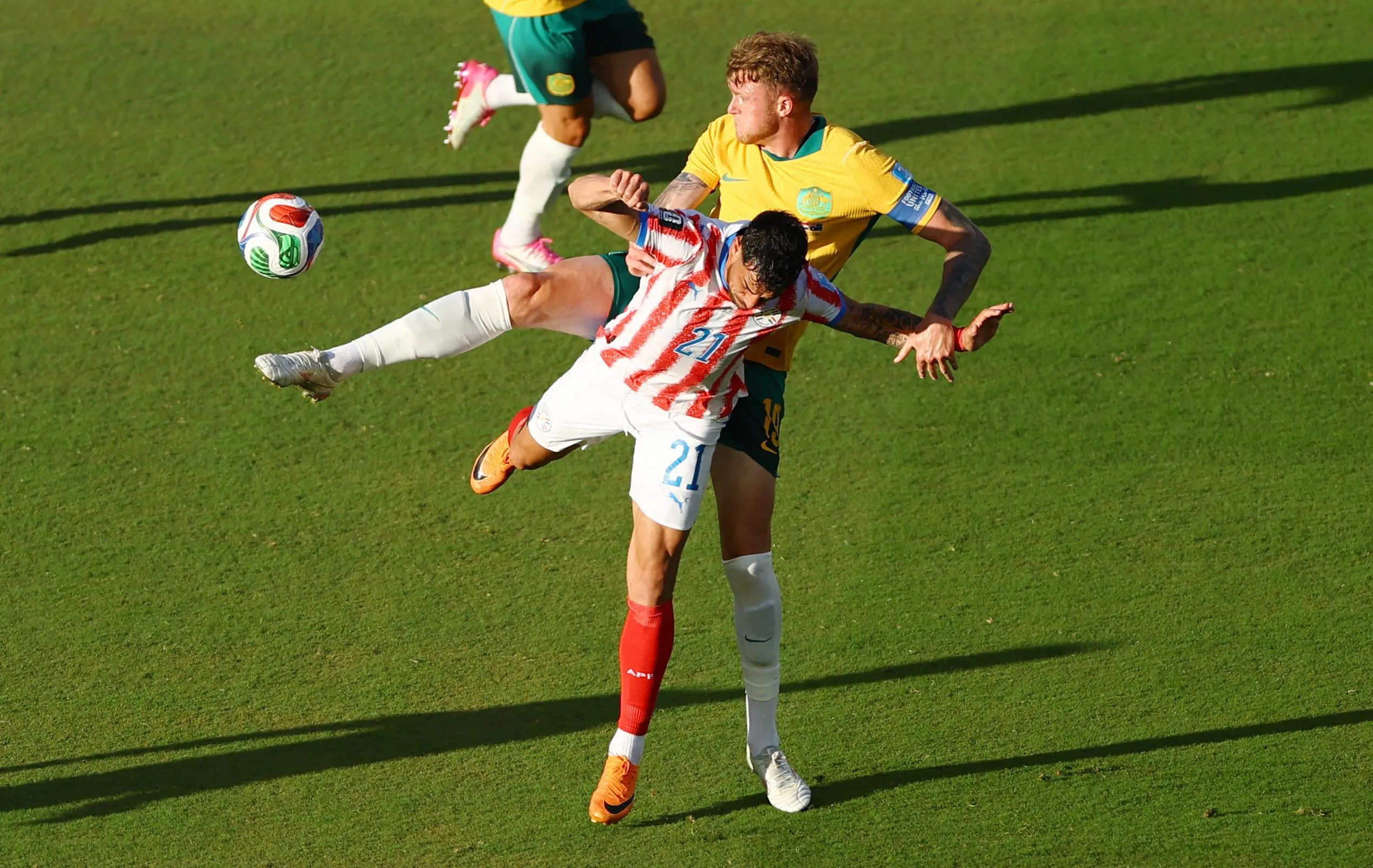 Paraguay's Gabriel Avalos in action with Australia's Harry Souttar