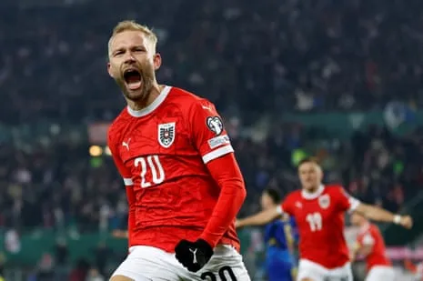 Konrad Laimer celebrates after scoring for Austria Konrad Laimer celebrates after scoring for Austria