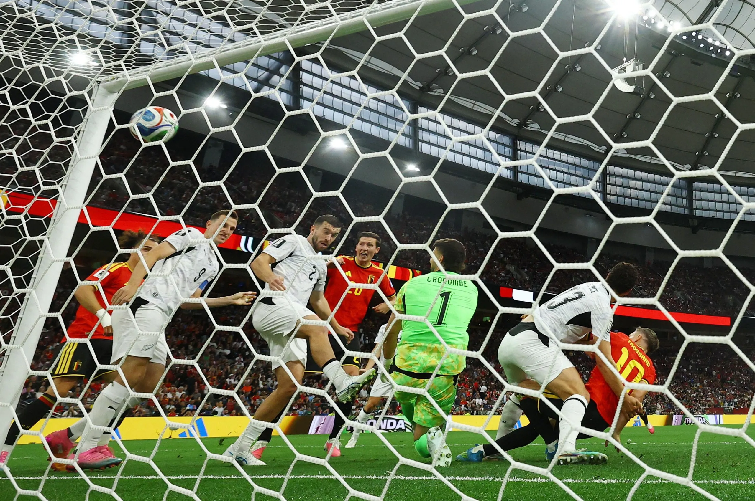 Belgium's Leandro Trossard scores their first goal