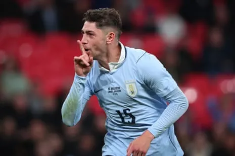 Federico Valverde celebrates by putting his finger to his mouth during an international friendly with England at Wembley