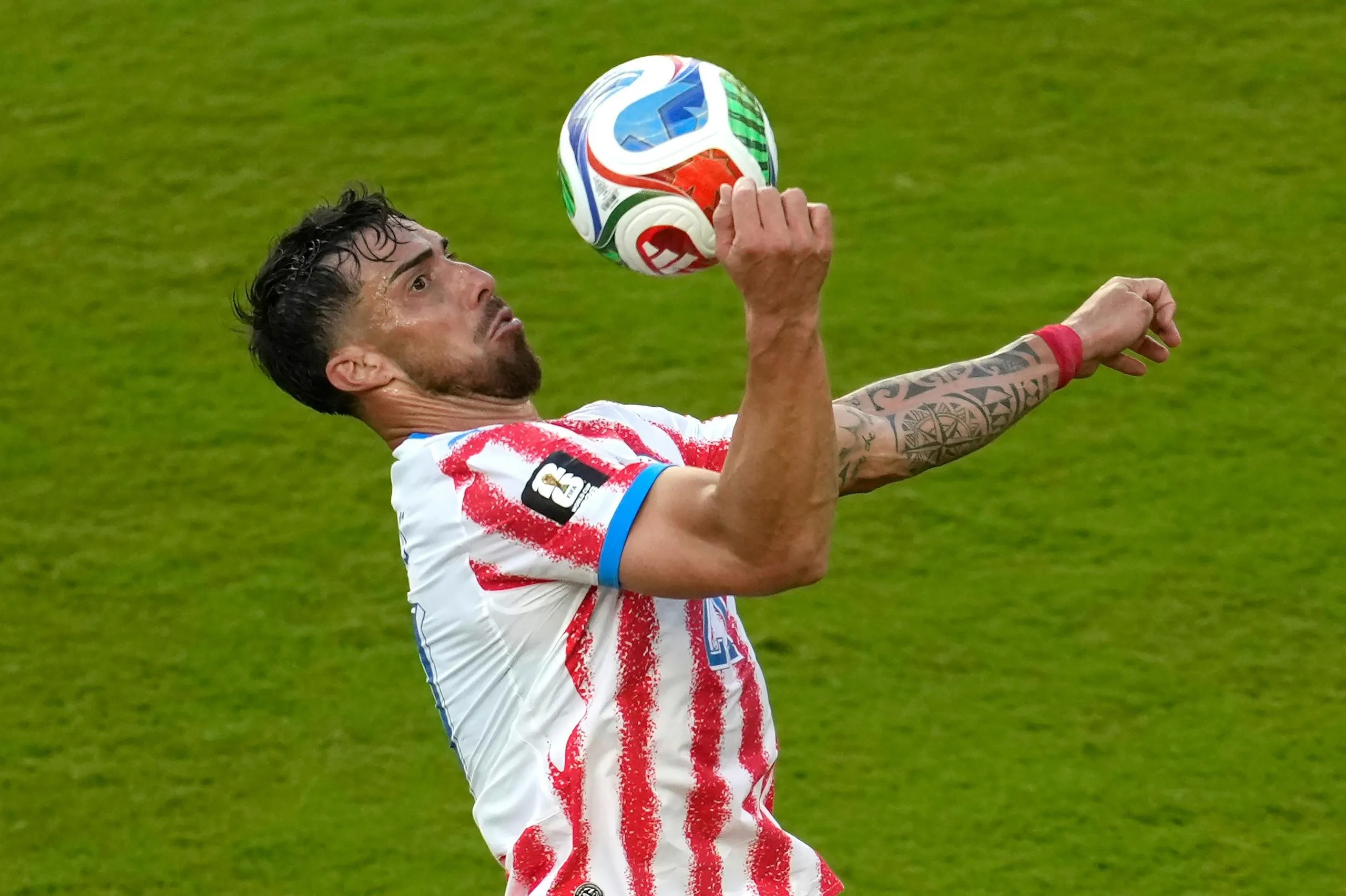Paraguay's Gabriel Avalos controls the ball