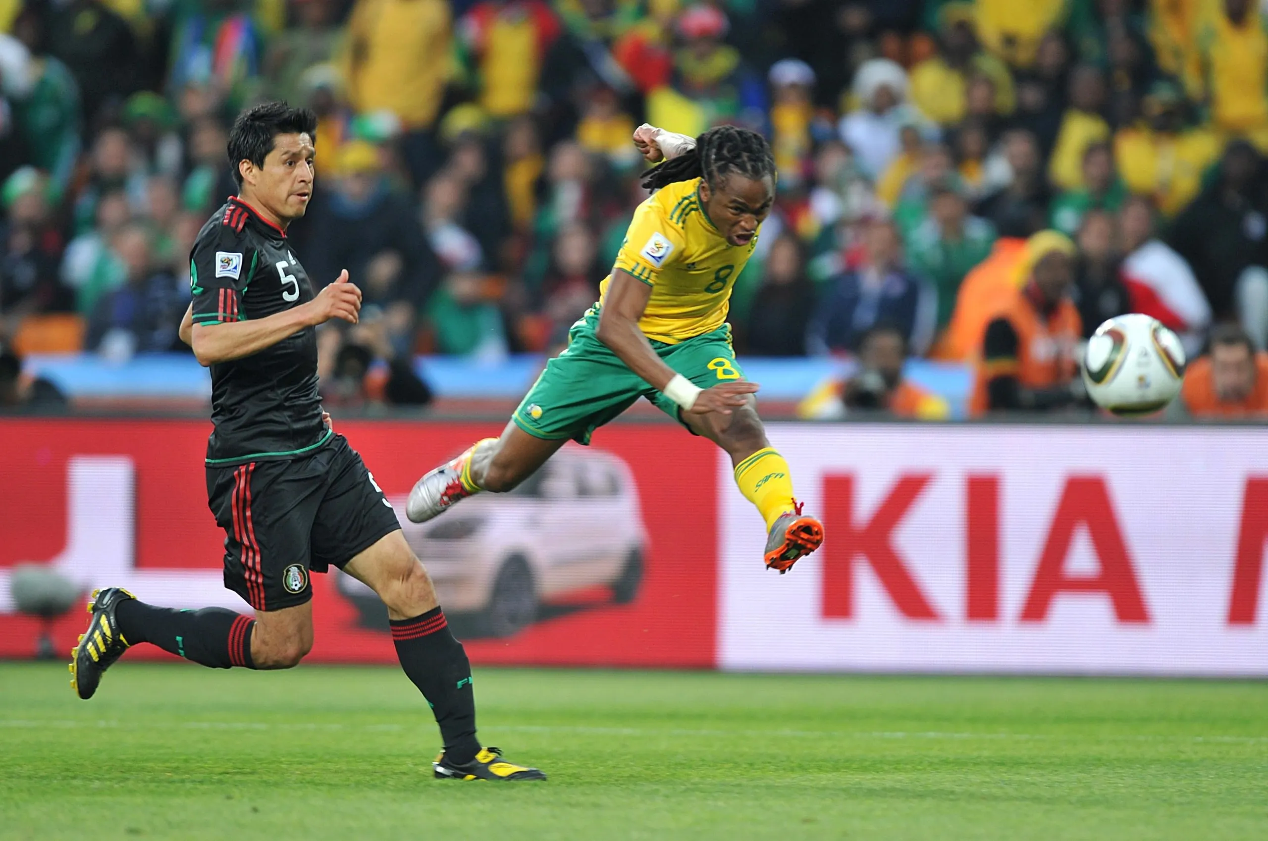 Siphiwe Tshabalala hits a shot so hard that he ends up with both feet well off the ground in his follow through - he scored the opening goal of the 2010 men’s World Cup while playing for South Africa against Mexico in Johannesburg.