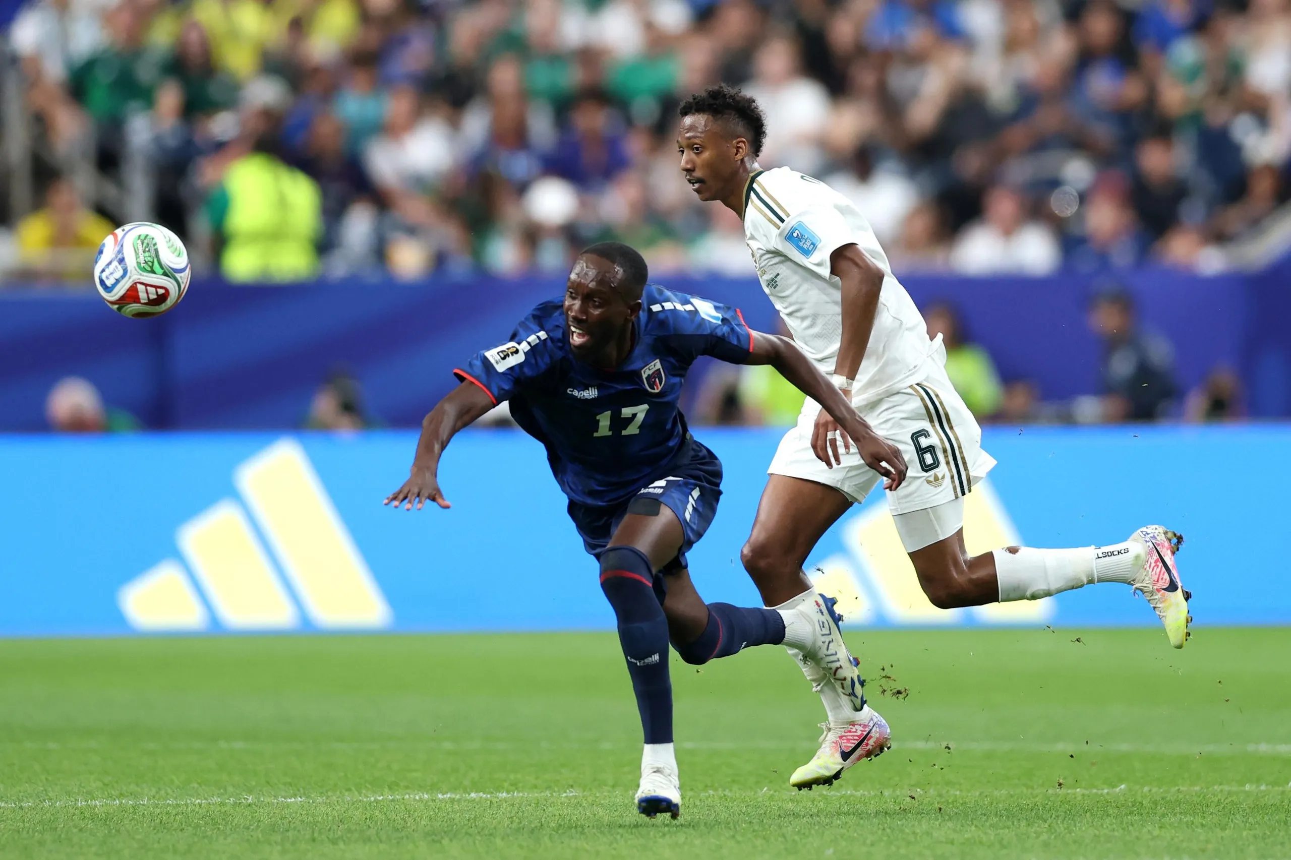 Willy Semedo is tripped by Nasser Al-Dawsari.