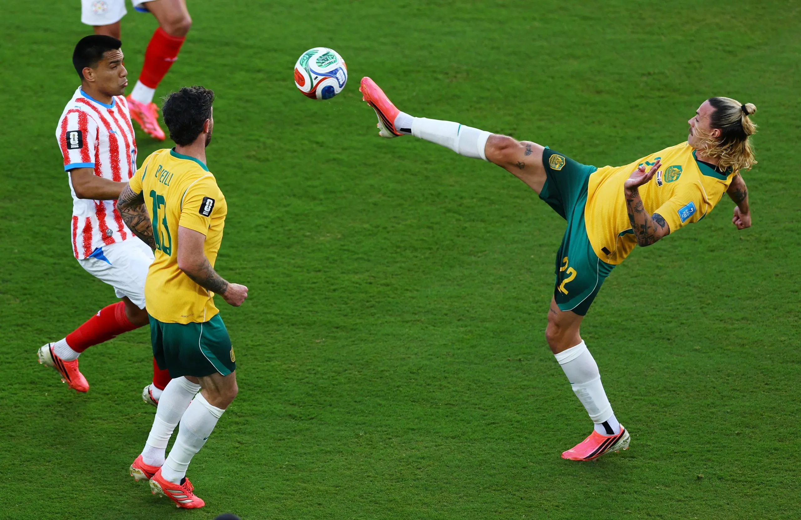 Australia's Jackson Irvine and Aiden O'Neill in action