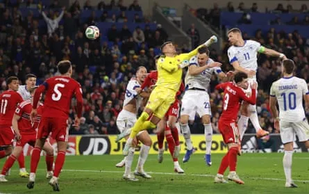Edin Dzeko equalises against Wales in their playoff in Cardiff