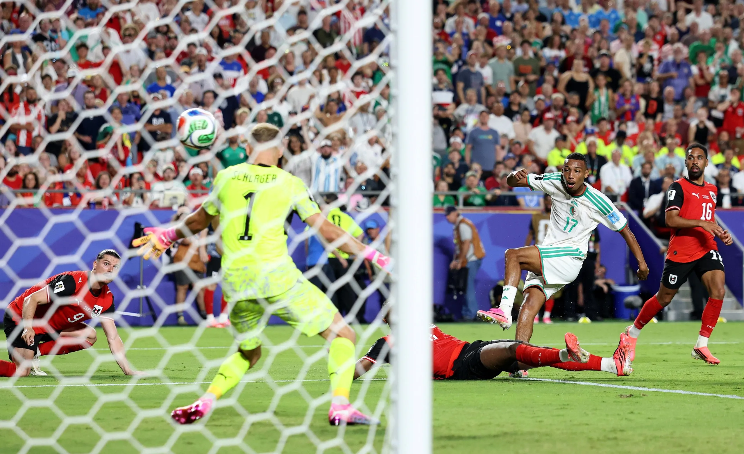 Rafik Belghali equalises for Algeria