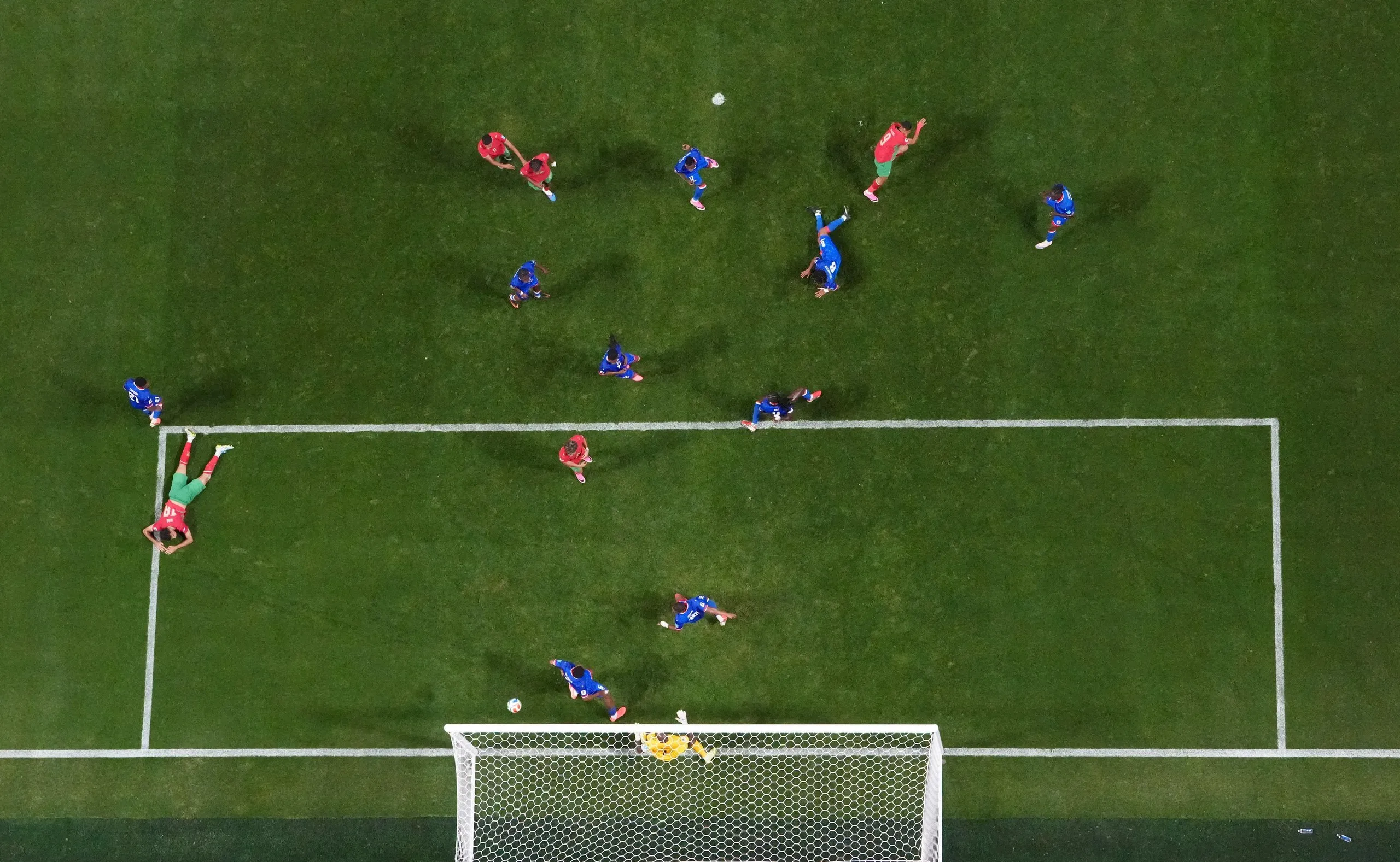 Soufiane Rahimi scores their third goal past Haiti's Johny Placide