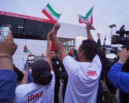 A small group of fans gathers at Tijuana airport to cheer the team A small group of fans gathers at Tijuana airport to cheer the team