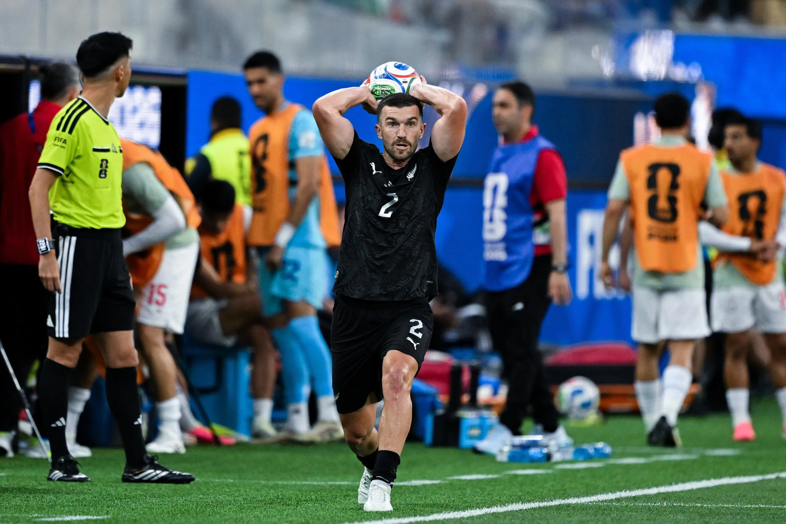 Tim Payne takes a throw-in.