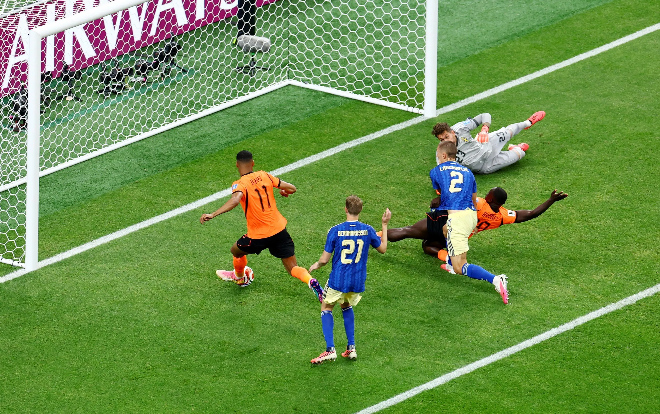 Netherlands' Cody Gakpo scores the third goal against Sweden.
