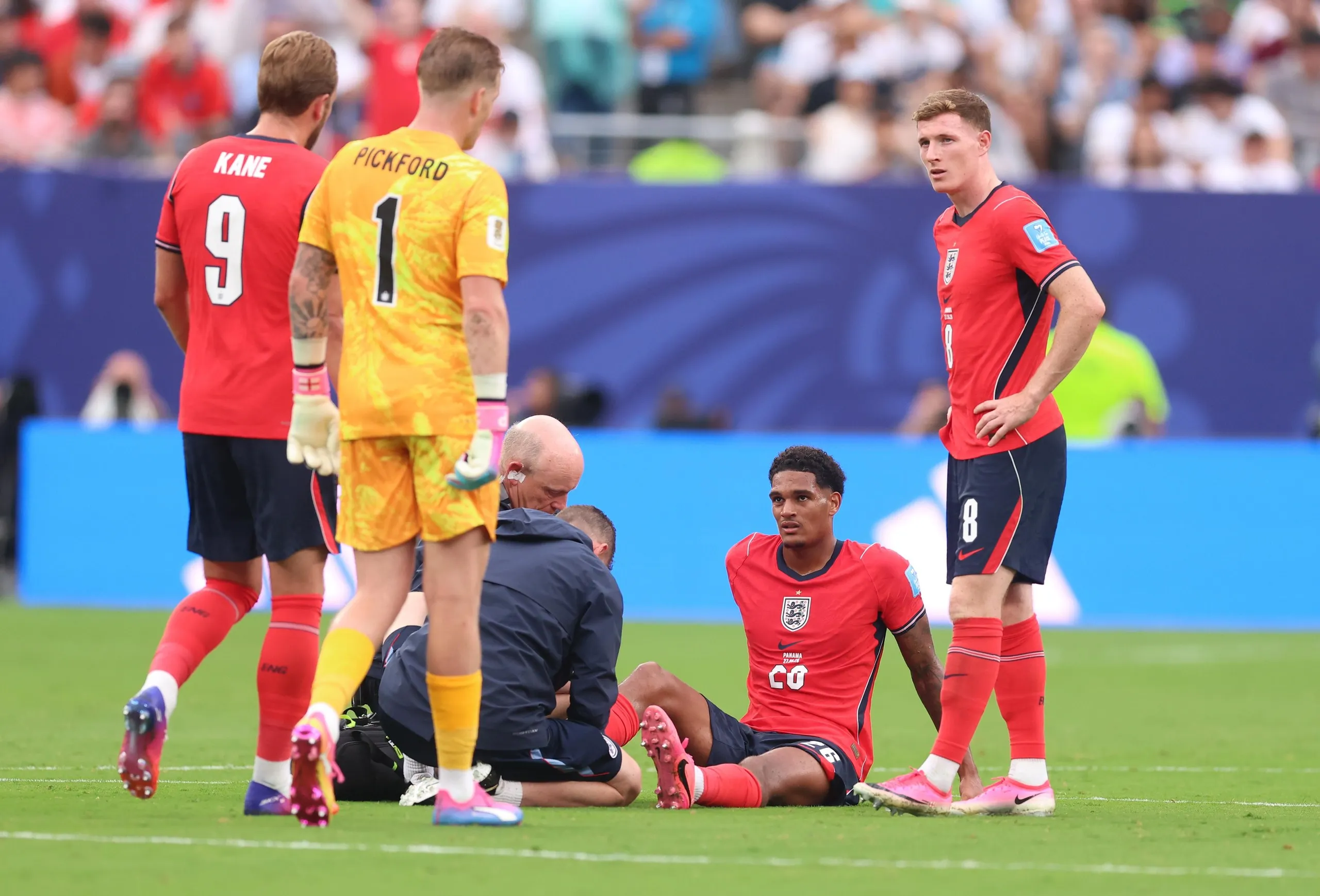 Jarell Quansah is treated for an injury 