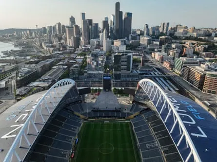 An aerial view of Lumen Field with the city behind.