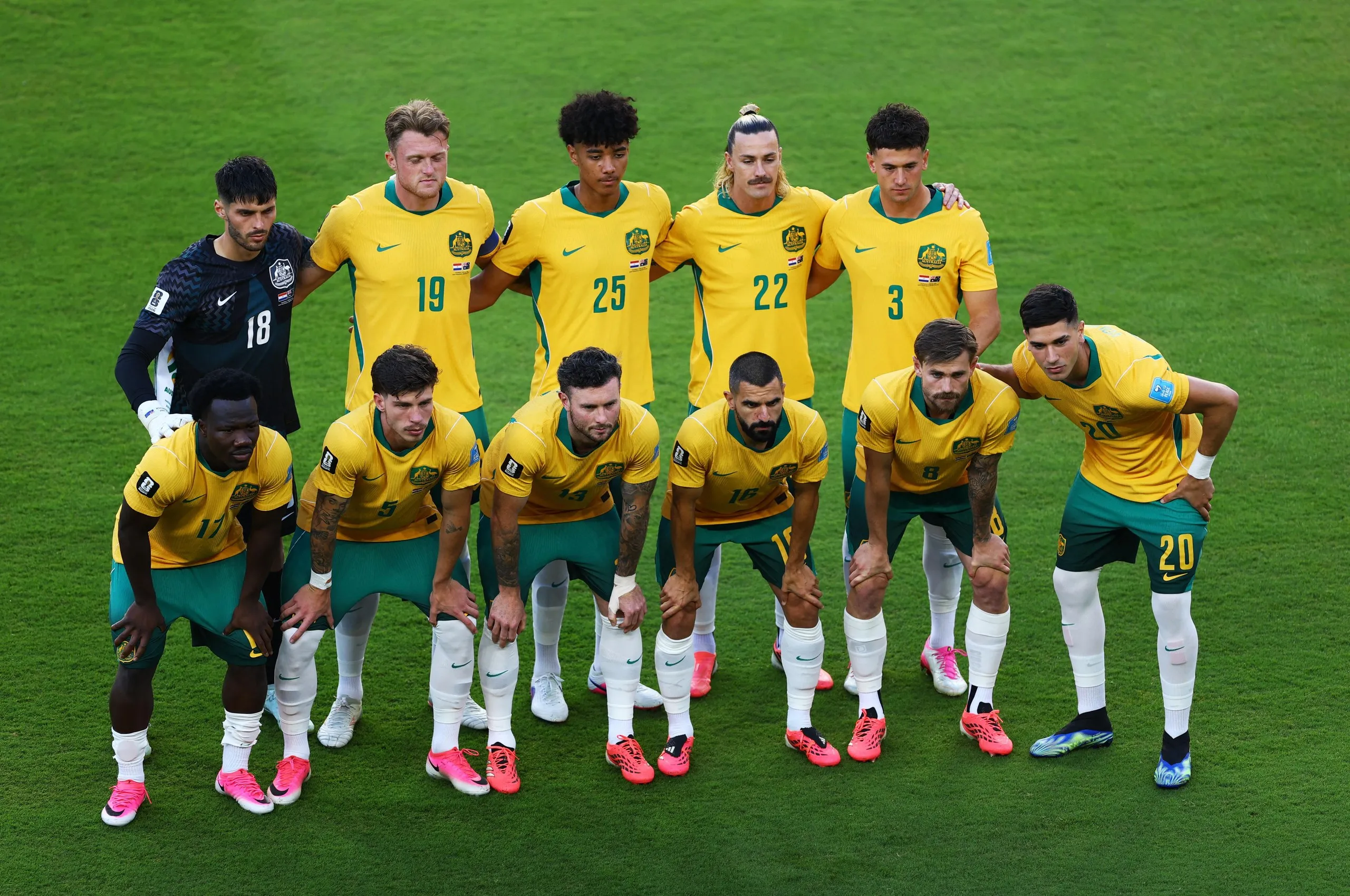 Australia players pose for a team group photo before the match