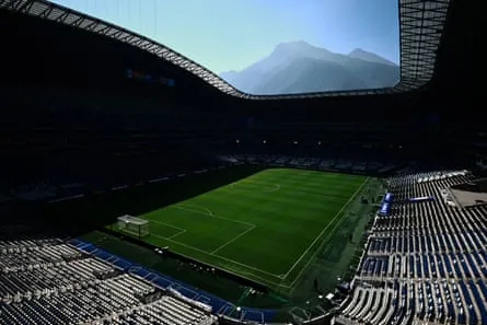 A view of the empty Estadio BBVA with the Cerro de la Silla mountain peak in the background.