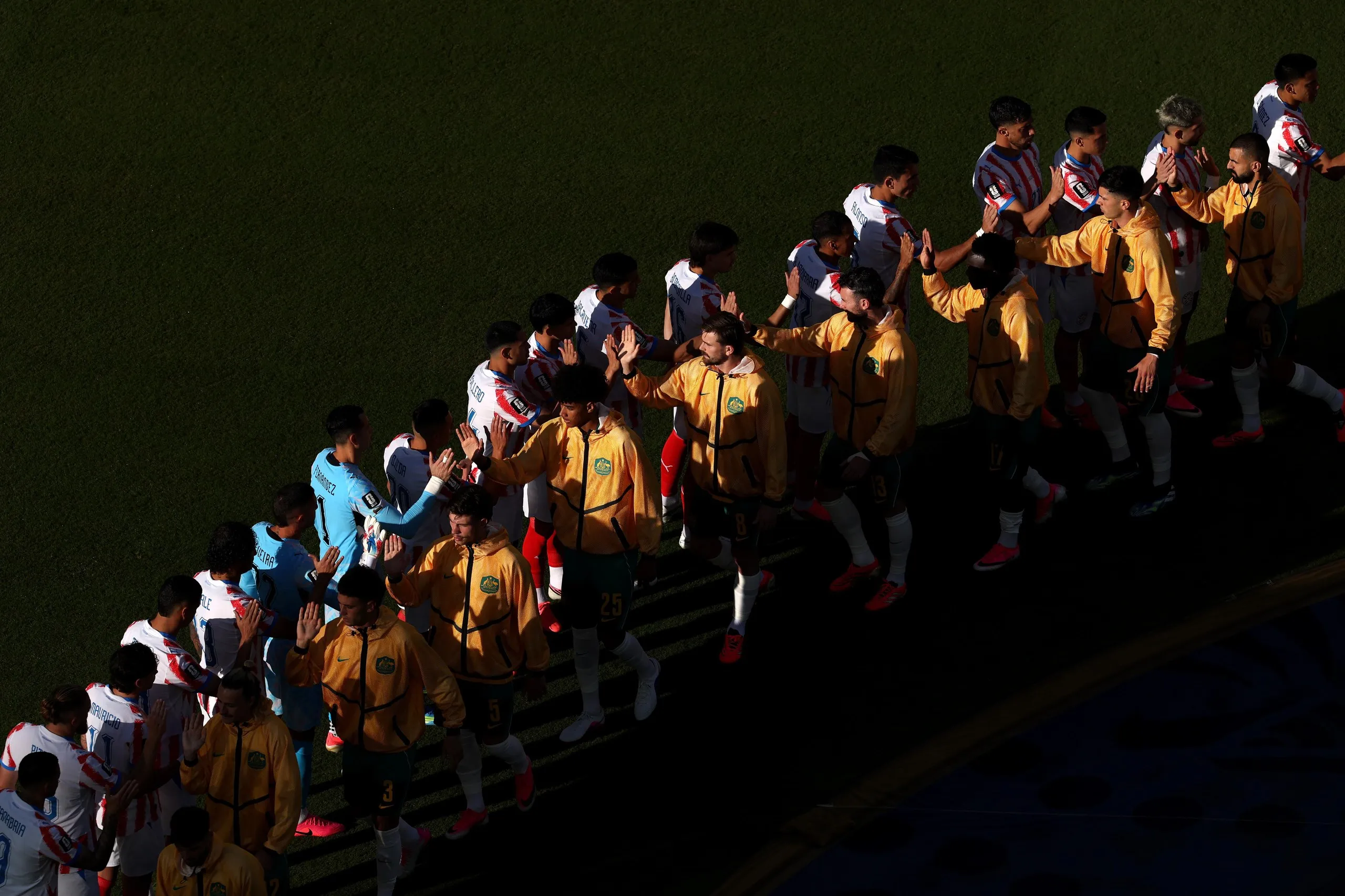 Players high five