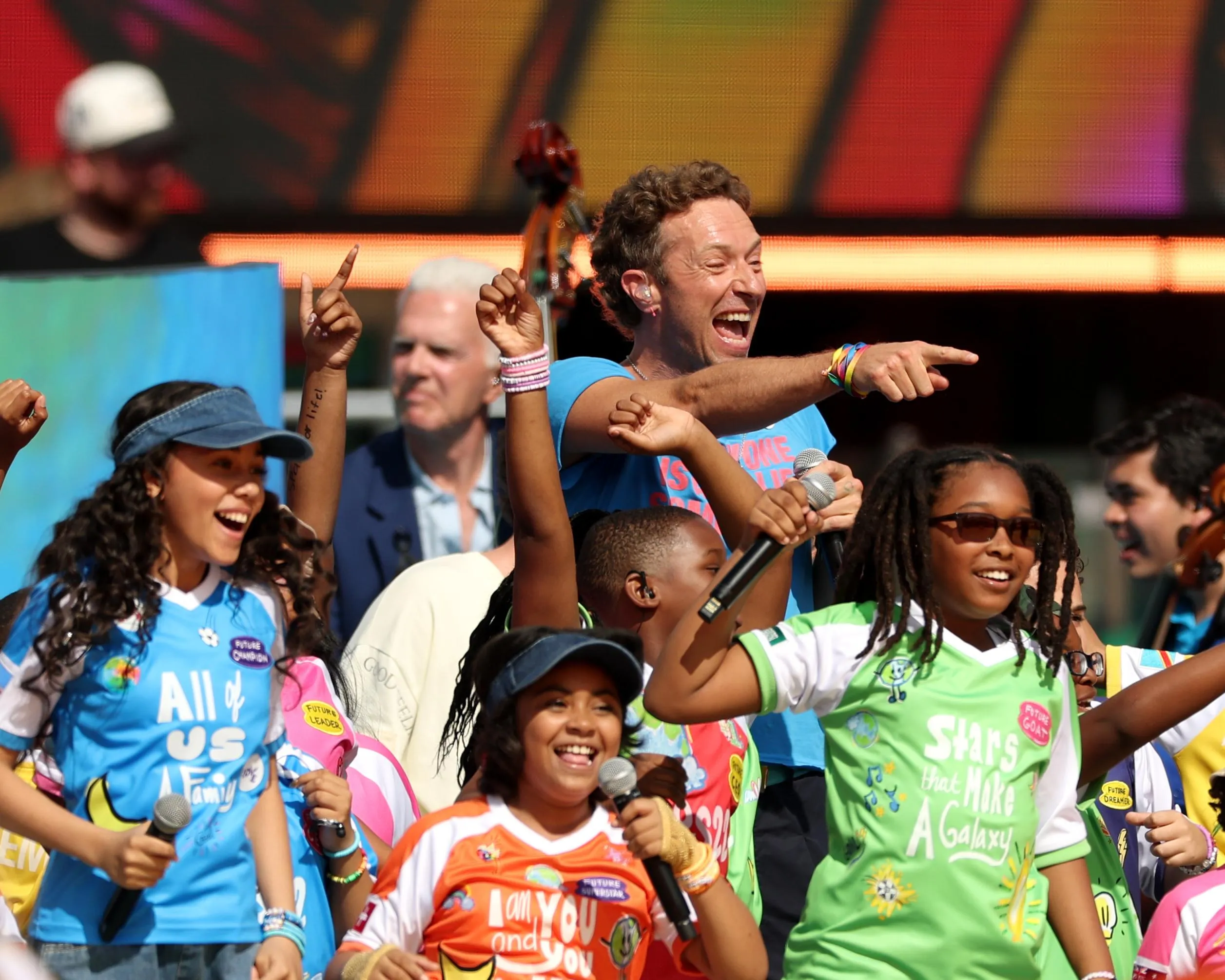 Coldplay’s Chris Martin and a local school choir