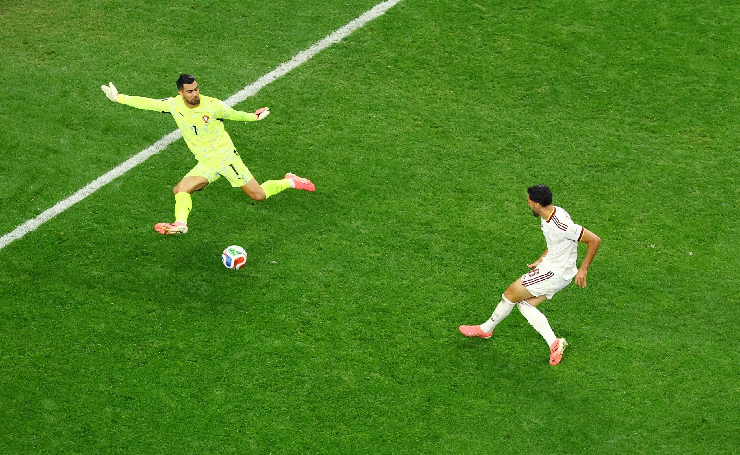 Merino fires past the onrushing Diogo Costa