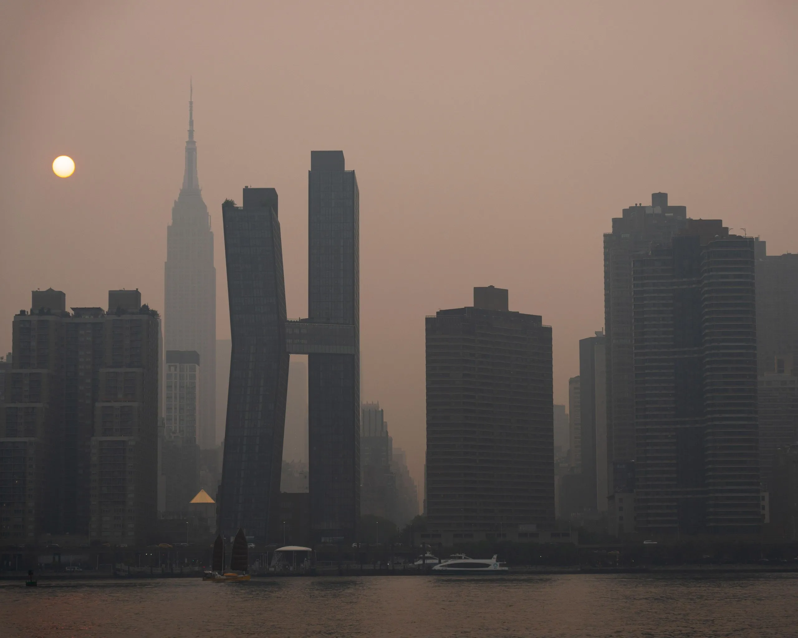 Murky scenes along the East River in New York City on Thursday.