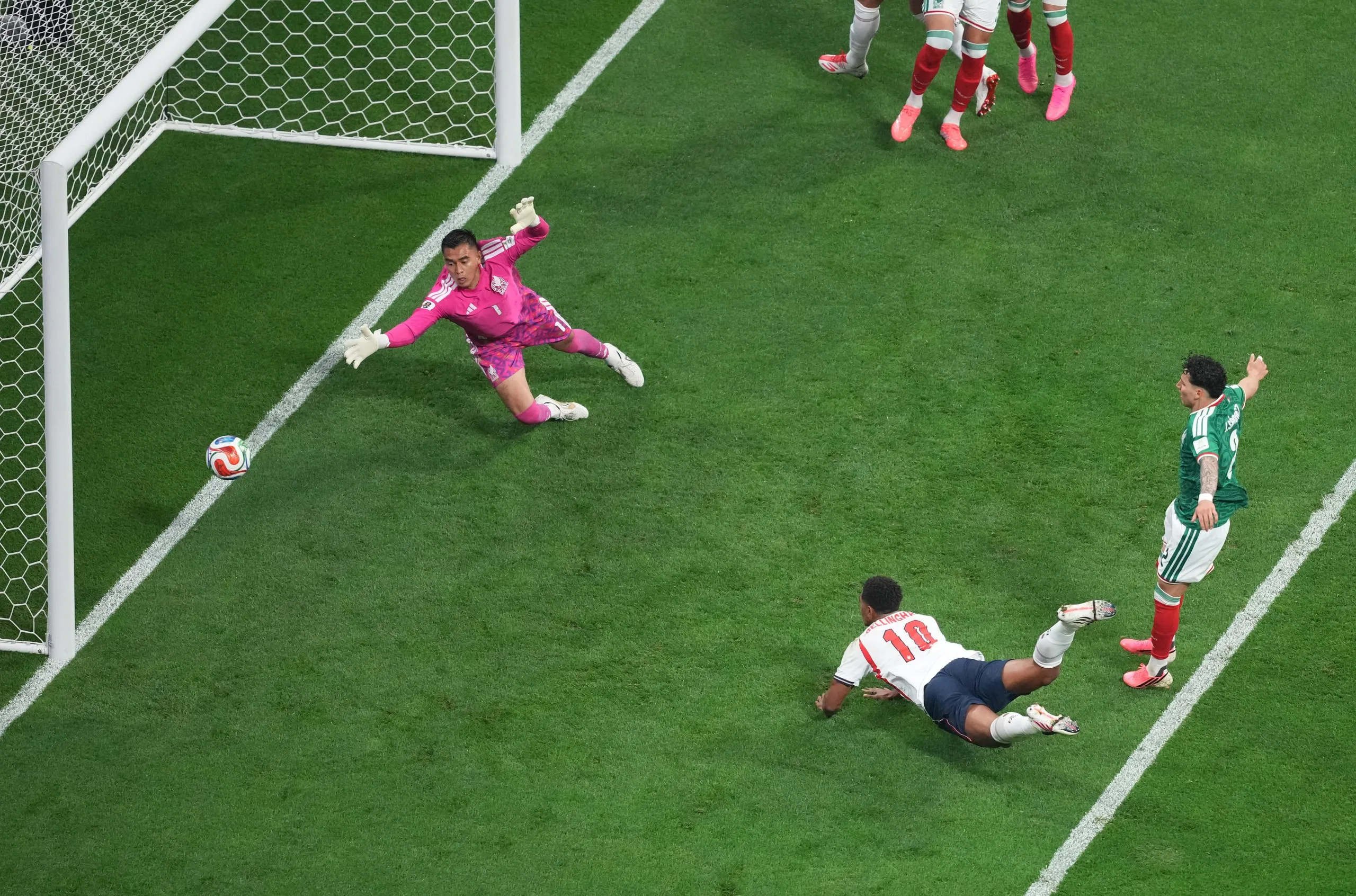 Jude Bellingham heads England into the lead against Mexico.