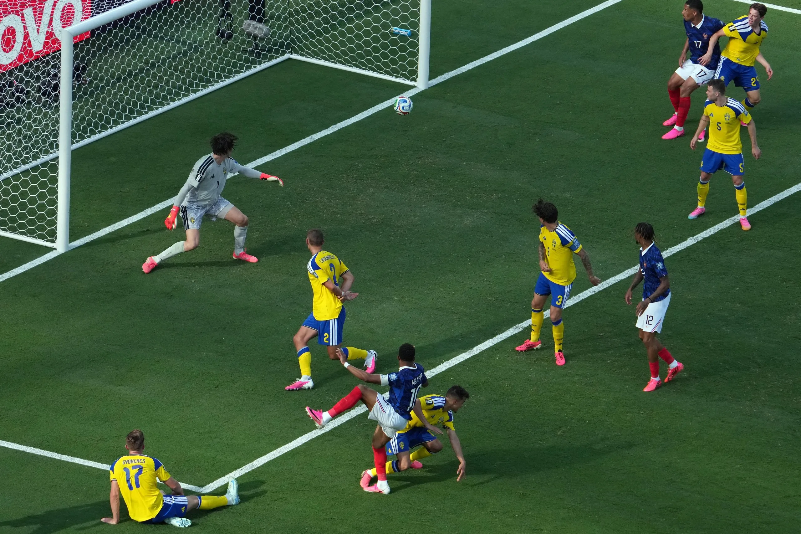 France’s forward Kylian Mbappé scores his team’s first goal against Sweden
